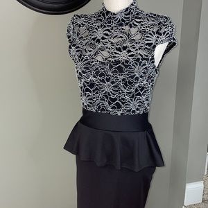 Womens beautiful black dress. Fits size 2/4